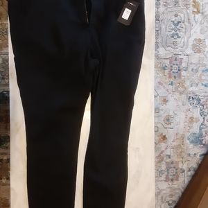 A pair of black Fashion Nova jeans.